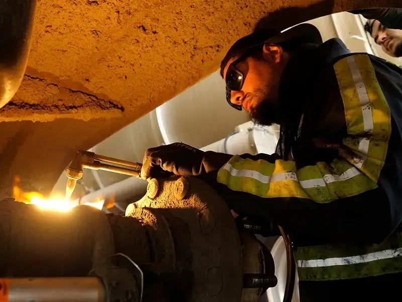 Gazelle worker welding a metal piece